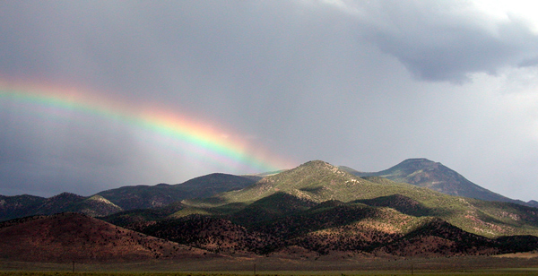 Desert storm and rainbow